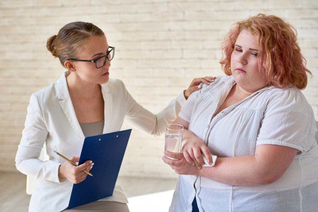 Therapist Comforting Obese Client